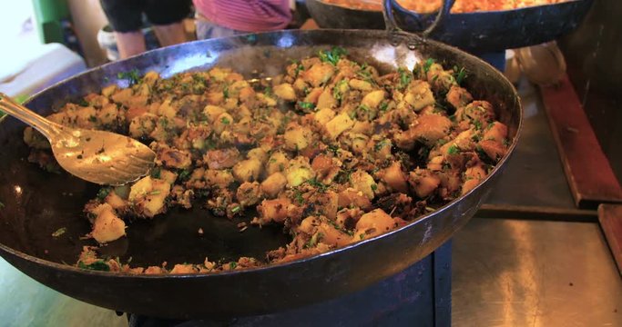 Close up view of cooking Indian food