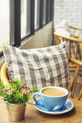 Morning hot chocolate in coffee shop background