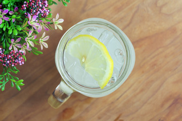 Jar glass lemonade soda on wooden table