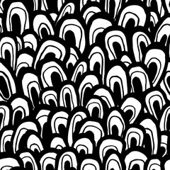 Seamless abstract pattern. Handmade shapes, looks like waves, fish scale or forest, black and white colors. Relaxed geometry. Textile design.