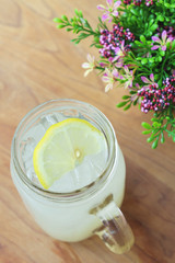 Obraz na płótnie Canvas Jar glass lemonade soda on wooden table