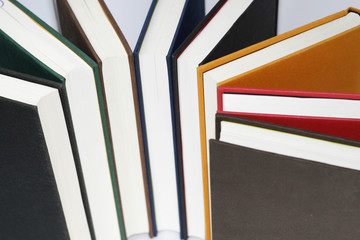 colorful hardback books seen from above