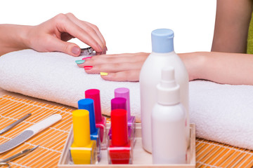 Woman in hand treatment manicure concept