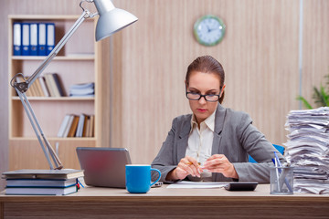 Busy stressful woman secretary under stress in the office