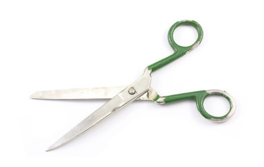 Old large pair of scissors on a white background