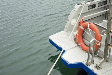 Close up of stern boat and lifeboat
