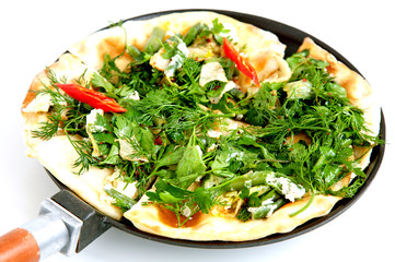 Thin armenian pita bread with cheese, pepper and herbs