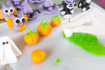 Confectioner with figures of halloween