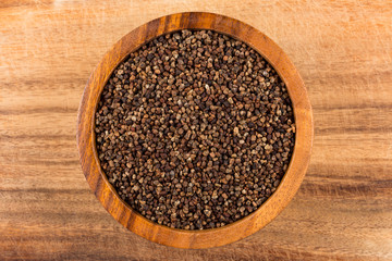 Decorticated cardamom seeds in a bowl