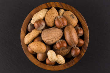Mixed nuts in shells in a bowl