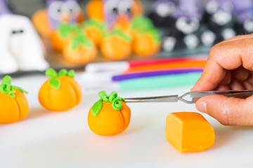 Confectioner with figures of halloween