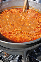 ukrainian borsch boiling in the very big kettle