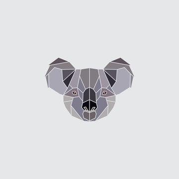 Koala colored head. Geometric logo polygonal silhouette isolated on grey background. Design element illustration.