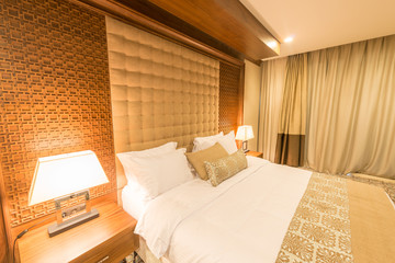 Modern hotel room with big bed