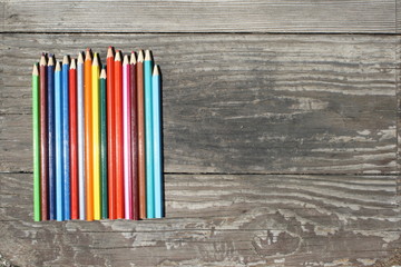 Close up of colored pencils arranged on the table