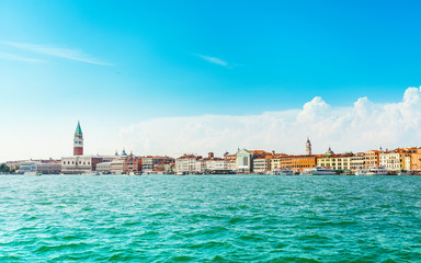 View of the Campanile in San marco's square and embankment from the sea in Venice, Italy.