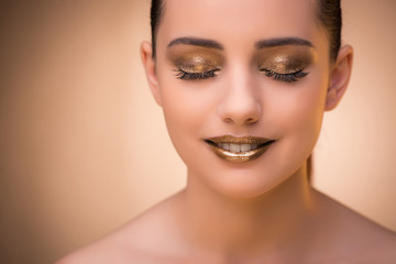 Woman with beautiful make-up against background