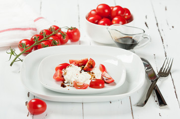 Cherry Tomatoes, Soft Cottage Cheese. White Table.