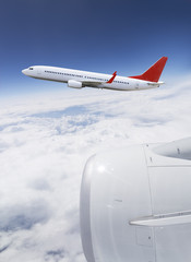 Plane flying over the cloud