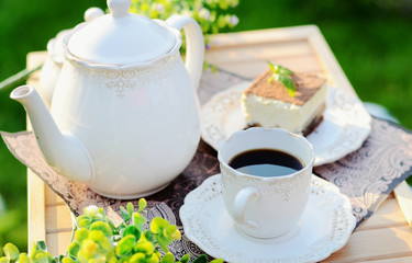 Sweet breakfast - a cup of coffee with cake