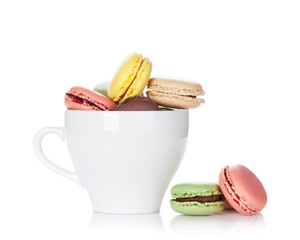 Colorful macaroons in cup
