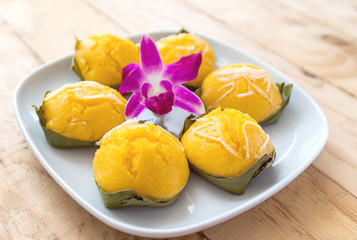 Toddy plam cake is a thai dessert, made from flour, eggs and sugar, sprinkle with coconut.