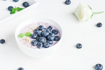Healthy breakfast with yogurt, muesli and blueberry