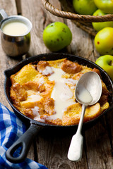 CARAMEL APPLE STRATA in a pig-iron frying pan.