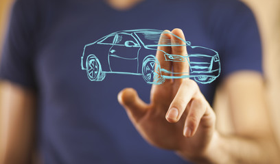 Hand holding car