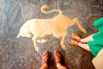 Bull symbol of Turin city on the floor near San Carlo square in Piedmont region in Italy