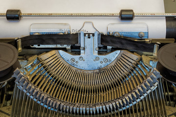 Writing letter on old vintage retro dirty typewriter