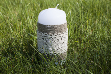decorative candle in grass