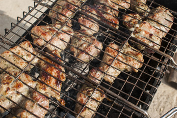 BBQ cooked on the grate of the grill