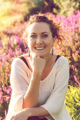 young woman portrait in autumn heathers