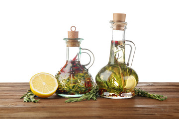 Olive oil with spices, isolated on white