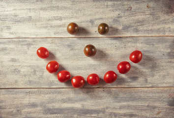 Healthy Organic Vegetables Tomatoes on a Wooden Background. Art