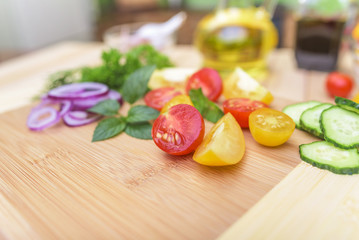 Cutting the vegetables on salad.