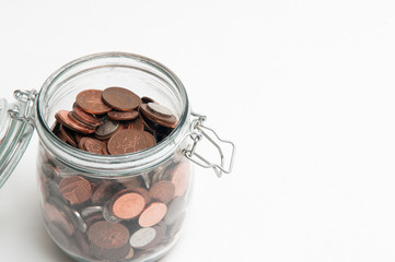 Savings jar on white
