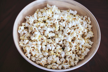 large white plate with popcorn