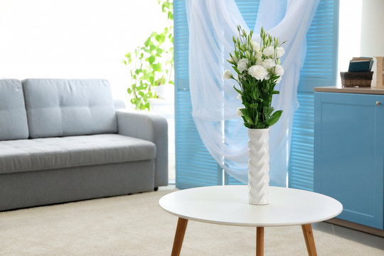 Contemporary interior with bouquet of flowers in vase