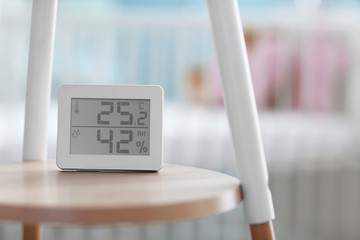 Digital temperature and humidity control in baby room - obrazy, fototapety, plakaty