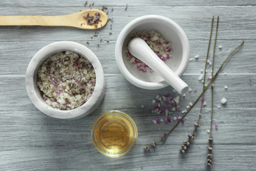 Natural scrub ingredients on white wooden background