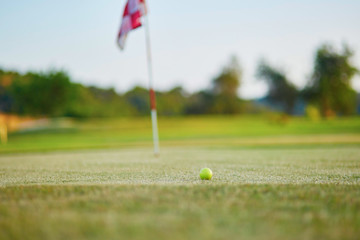 Closeup of golf ball on green