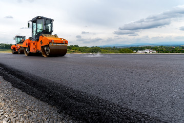 Road rollers working on the construction site