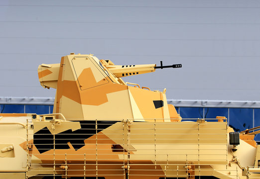 Tower of the camouflaged armored personnel carrier