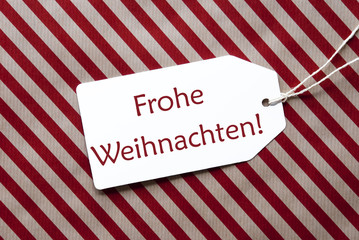Label On Red Wrapping Paper, Frohe Weihnachten Means Merry Christmas