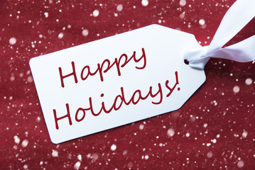 Fototapeta na wymiar One Label On Red Background, Snowflakes, Text Happy Holidays
