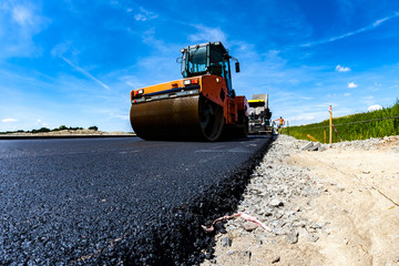 Road roller working on the construction site