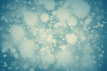 Vector teal bokeh background. abstract defocused bright lights