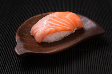 Fresh Sushi salmon on wood dish